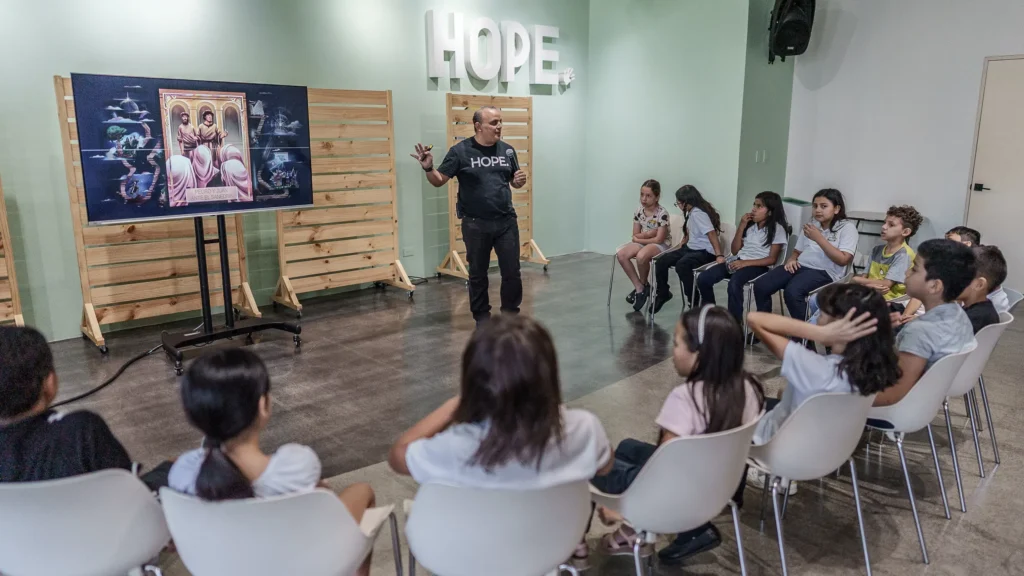 Local staff and children together at the Hope Center in Pavas